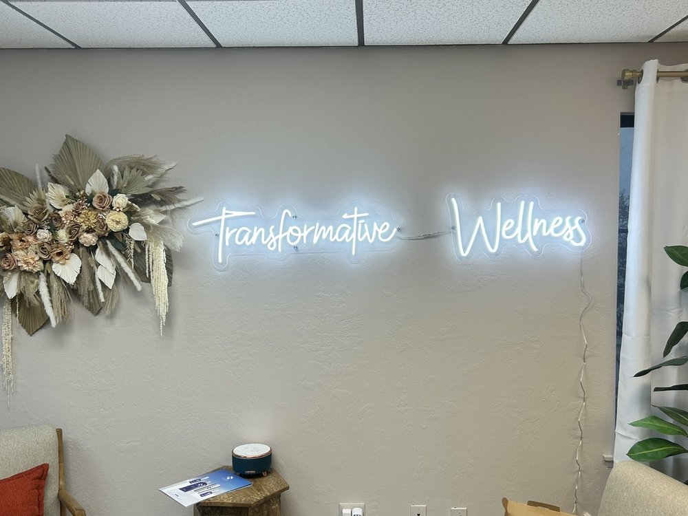 Transformative Wellness neon sign